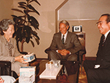 Tadashi Goto, presenting Mr. Reischauer, who served as U.S.
    Ambassador to Japan, and Mrs. Reischauer with his newly-developed
    camera.